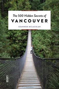 A suspension bridge across Lynn Canyon Park, on cover of 'The 500 Hidden Secrets of Vancouver', by Luster Publishing.