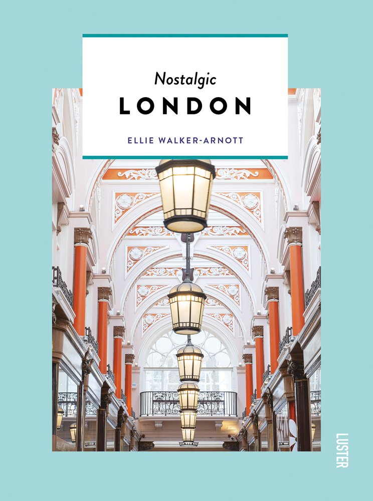 Interior of Victorian building, The Royal Arcade with ceiling lanterns, on pale blue cover of 'Nostalgic London', by Luster Publishing.