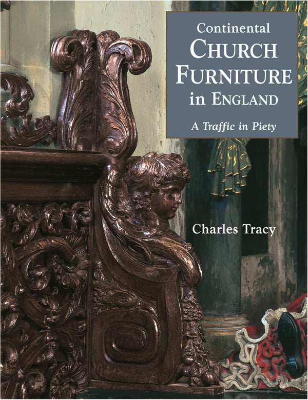 Dark carved wood church pew on cover of 'Continental Church Furniture in England, A Traffic in Piety', by ACC Art Books.