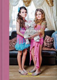 Book cover of Urban Gypsies , with two female travelers in pink and blue sparkly dresses, holding a sleeping baby. Published by Hoxton Mini Press.