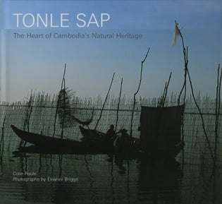 Tonle Sap great lake of Cambodia with boat, on cover of 'Tonle Sap', by River Books.