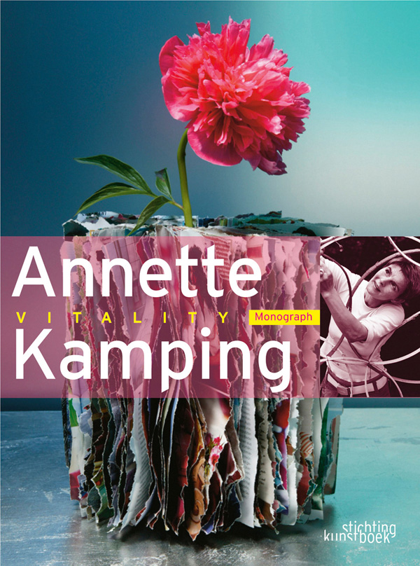 Book cover of Annette Kamping: Vitality, with bright pink flower poking up from a pot made of magazine sheets. Published by Stichting.
