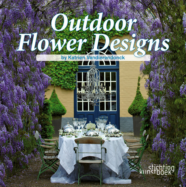 Book cover of Outdoor Flower Designs, with an outdoor table arrangement surrounded by arches of purple wisteria, chandelier hanging above. Published by Stichting.