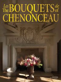 Book cover of The Bouquets of Chenonceau, featuring a bouquet of flowers in a large urn with base, in front of decorative fireplace. Published by Stichting.