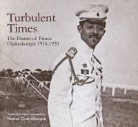 Book cover of Turbulent Times: The Diaries of Prince Chakrabongse 1916 - 1920, with the Prince in white uniform and cap, smiling. Published by River Books.