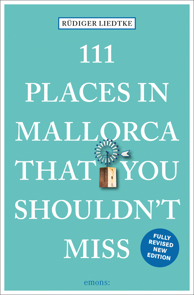 Windmill near centre of green cover of '111 Places in Mallorca That You Shouldn't Miss', by Emons Verlag.