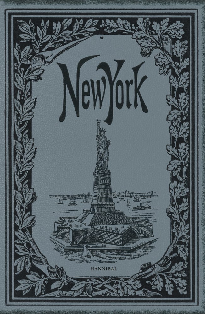 New York Empire State Building on grey cover of 'New York, A Photographic Journey', by Hannibal Books.