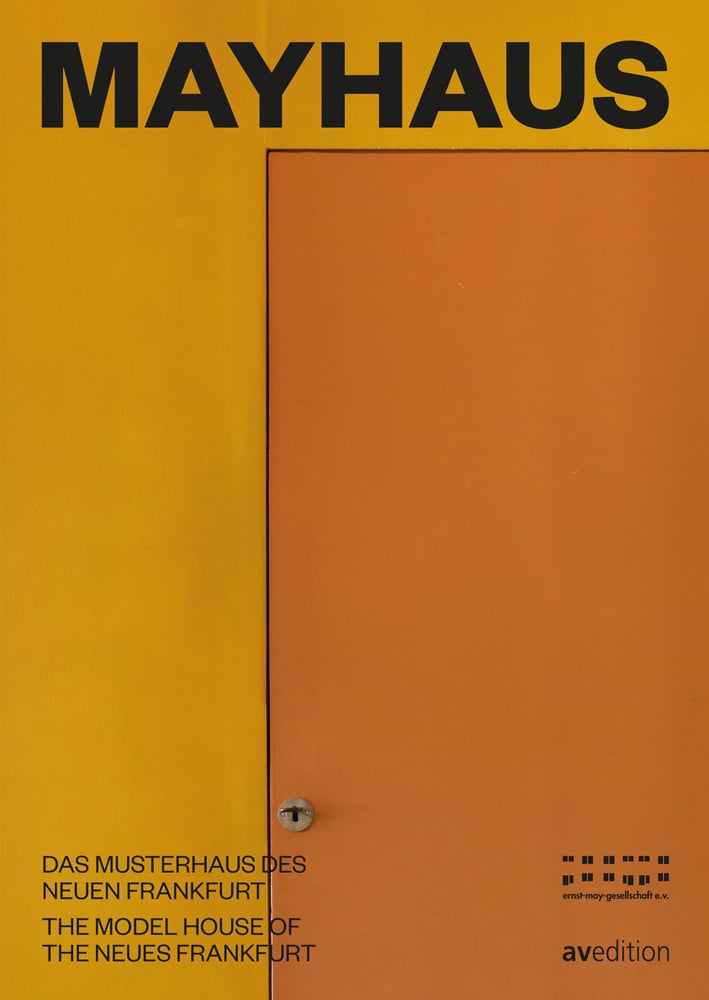 Orange door with key in lock, on cover of 'mayhaus, Das Musterhaus des Neuen Frankfurt', by Avedition Gmbh.