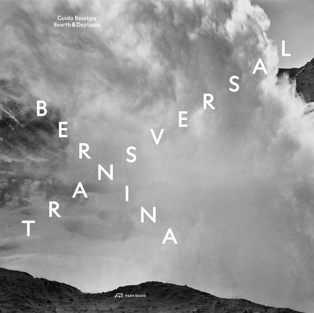 Black and white atmospheric photo of mountainous landscape with white mist and Bernina transversal in white font in cross shape