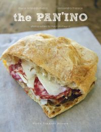 Salami and cheese panini on baking paper, on cover of 'The Pan'Ino', by Guido Tommasi Editore.
