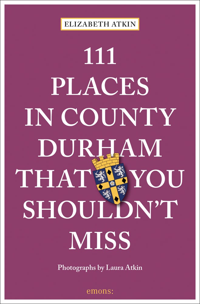 Coat of arms near centre of mulberry cover of '111 Places in County Durham That You Shouldn't Miss', by Emons Verlag.