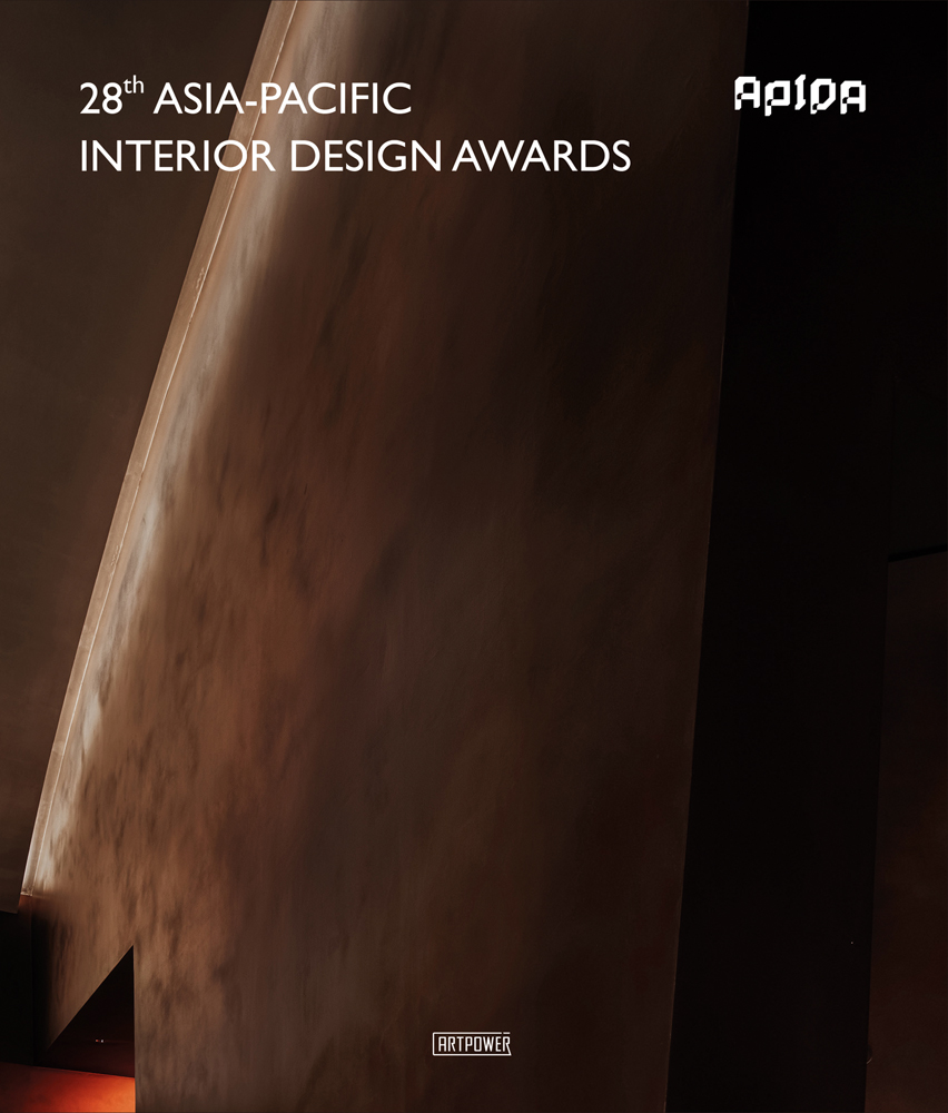 Dark brown interior wall, on cover of '28th Asia-Pacific Interior Design Awards', by Artpower International.