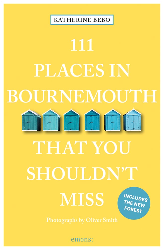 Row of beach huts to centre of pale yellow cover of '111 Places in Bournemouth That You Shouldn't Miss', by Emons Verlag.