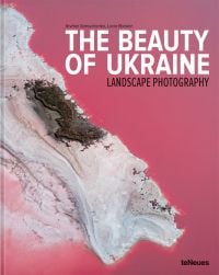 Aerial shot of pink waters of Lake Lemuria, white salt coastline, THE BEAUTY OF UKRAINE LANDSCAPE PHOTOGRAPHY in white, and black font above.