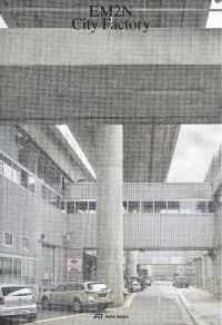 Book cover of EM2N – City Factory, Advocating for a City of Tolerant Co-Existence, with large grey industrial building with support pillar. Published by Park Books.