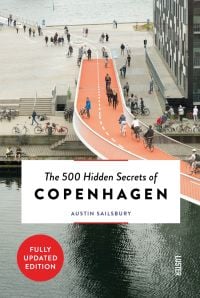 Cykelslangen, cyclists bridge over river, on cover of 'The 500 Hidden Secrets of Copenhagen', by Luster Publishing.