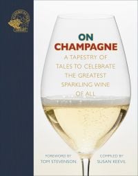Glass of champagne on cover of 'On Champagne, A tapestry of tales to celebrate the greatest sparkling wine of all… by Academie du Vin Library.