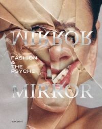 Portrait of white female on magazine page with folds skewing face, on cover of 'Mirror Mirror, Fashion & the Psyche', by Hannibal Books.
