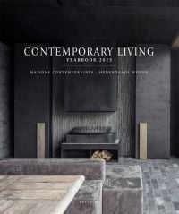 Dark grey interior with slate tiles, modern steel fireplace with logs on cover of 'Contemporary Living Yearbook 2023', by Beta-Plus.