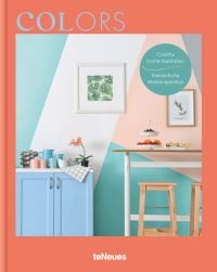 Interior space with peach, white and mint wall colour, breakfast bar, on cover of 'Colors', by teNeues.
