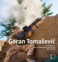 US Marine William Olas Bee has a close call after Taliban fighters opened fire near Garmser in Helmand in 2008, on cover of 'Goran Tomas?evic?', by Edition Lammerhuber.