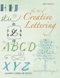 Book cover of The Art of Creative Lettering, Calligraphy Techniques and Exercises, with letters of the alphabet in script font, alongside tree made of letters. Published by White Star.