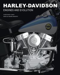 Close-up of chrome motorcycle engine, with blue and white tank above, on cover of 'Harley-Davidson, Engines and Evolution', by White Star.