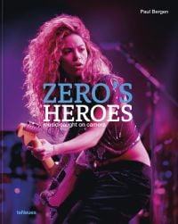 Book cover of Paul Bergen's Zero’s Heroes: Music Caught on Camera, with Shakira performing on stage with a guitar. Published by teNeues Books.