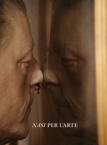 Book cover of Nasi Per L'Arte: Joanna De Vos & Melania Rossi, featuring a figure with a nosebleed pushing their face against a reflective surface. Published by Hopper&Fuchs.