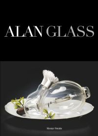 Book cover of Masayo Nonaka's Alan Glass, featuring an chicken shaped object made of light bulbs, sitting on a white plate. Published by Ediciones El Viso.