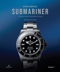 Book cover of Oyster Perpetual Submariner: The Watch that Unlocked the Deep, with a silver, black-faced Rolex watch. Published by Wallpaper*.