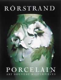Book cover of Bengt Nyström's Rörstrand Porcelain: Art Nouveau Masterpieces, with a decorative vase adorned with white flowers. Published by Abbeville Press.
