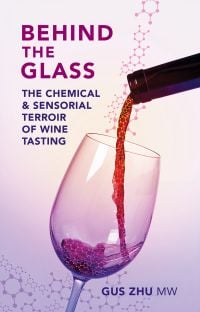 Book cover of Behind the Glass: The Chemical and Sensorial Terroir of Wine Tasting, with a glass of red wine being poured. Published by Academie du Vin Library.