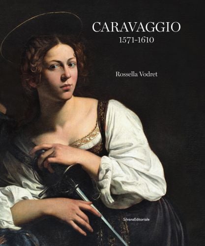 Book cover of Caravaggio: with a painting titled Saint Catherine of Alexandria. Published by Silvana.