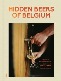 Book cover of Hidden Beers of Belgium, with a hand holding a glass under beer barrel with flowing pale liquid. Published by Luster Publishing.