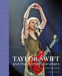 Book cover of Terry Newman's Taylor Swift, And the Clothes She Wears' featuring the singer on stage in silver sequin bodysuit and boots. Published by ACC Art Books.