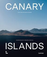 Book cover of Canary Islands: A Visual Travel Guide Through the Canarias, with a mountainous landscape. Published by Lannoo Publishers.