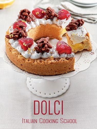 Book cover of Italian Cooking School: Dolci, with a ringed cake decorated with strawberries and pecans, on white cake stand. Published by White Star.