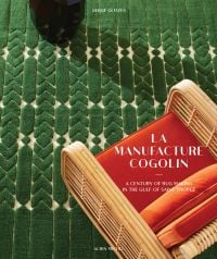 Book cover of La Manufacture Cogolin: A Century of Rug Making in the Gulf of Saint Tropez, with a wicker armchair with orange upholstery. Published by Albin Michel.