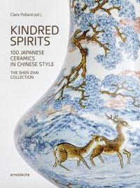 Book cover of Kindred Spirits: 100 Japanese Ceramics in Chinese Style. The Shen Zhai Collection, with a ceramic vase painting with blossom trees and deer. Published by Arnoldsche Art Publishers.