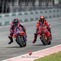 Book cover of Ducati Corse: 2024 Official Yearbook, with rider Jorge Martin racing alongside Francesco Bagnaia. Published by Silvana.