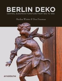 Book cover of Berlin Deko: Central European Furniture from 1910 to 1930, featuring a carved figure on the side of a piece of wood furniture. Published by Arnoldsche Art Publishers.