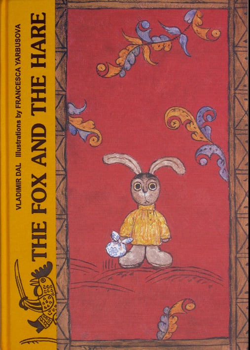 Book cover of Fox and the Hare, with a toy Hare. Published by Rovakada.