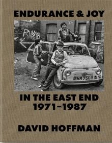 Book cover of Endurance & Joy in the East End 1971-87, with British Bengali children sitting on a car outside of a squat near Brick Lane. Published by Spitalfields Life Books.