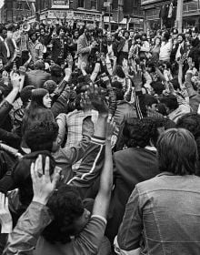 Book cover of Endurance & Joy in the East End 1971-87, with British Bengali children sitting on a car outside of a squat near Brick Lane. Published by Spitalfields Life Books.