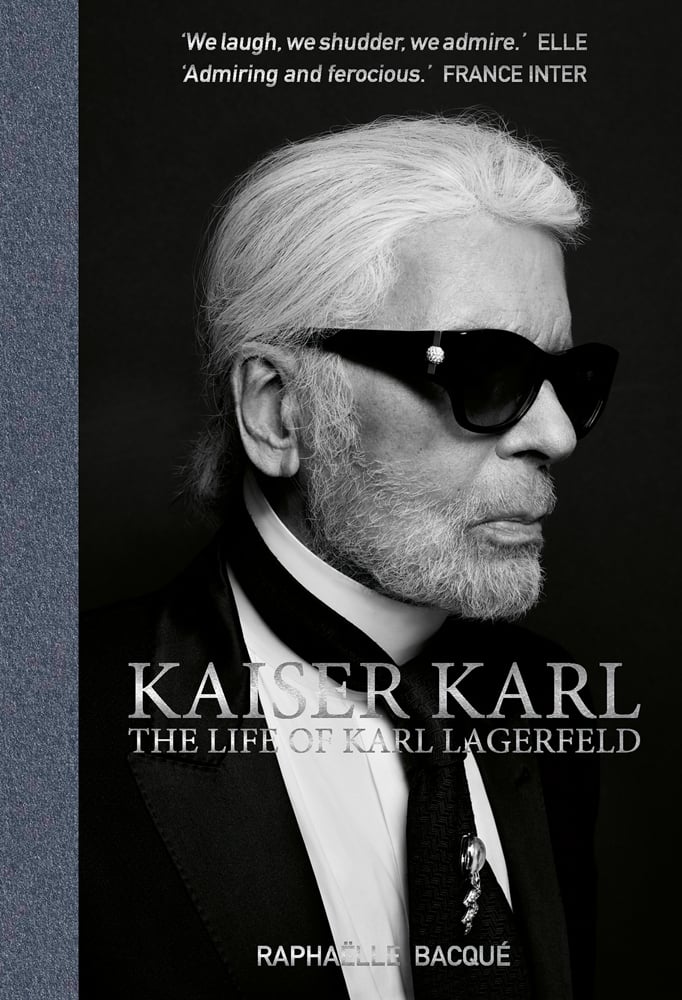 Book cover of Kaiser Karl, the life of Karl Lagerfeld, featuring the fashion designer wearing dark glasses. Published by ACC Art Books.