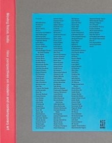 List of artists in black font on blue page, mounted on grey cover of 'Moving Focus', India, by ACC Art Books.