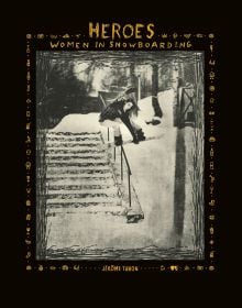 Female snowboarder sliding down rail of steps covered in snow, on cover of 'Heroes, Women in Snowboarding', by ACC Art Books.