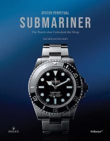 Book cover of Oyster Perpetual Submariner: The Watch that Unlocked the Deep, with a silver, black-faced Rolex watch. Published by Wallpaper*.