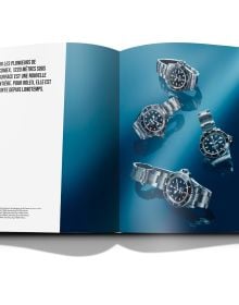 Book cover of Oyster Perpetual Submariner: The Watch that Unlocked the Deep, with a silver, black-faced Rolex watch. Published by Wallpaper*.